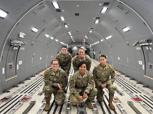 Image of Airmen posing for a photo.