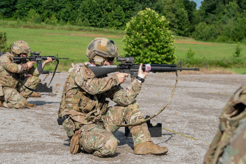 Tech. Sgt. Michael Bradley of the Kentucky Air Guard’s 123rd Special Tactics Squadron aims an M16A4 rifle while in the kneeling position July 13, 2025, during the Adjutant General’s Match, a marksmanship competition held at the Wendell H. Ford Regional Training center in Greenville, Ky. The event tested Soldiers and Airmen with realistic, combat-focused shooting scenarios designed to sharpen weapons proficiency and lethality. (U.S. Air National Guard photo by Airman 1st Class Angelee Barnett)