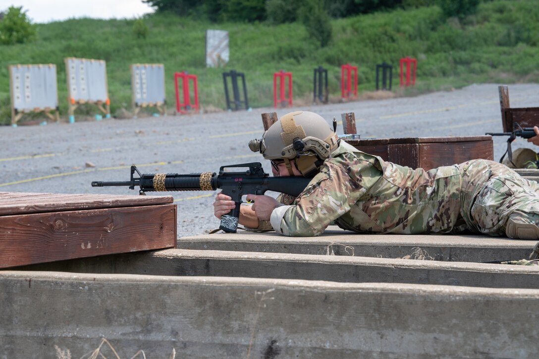 Airman 1st Class Charles Jenkins of the Kentucky Air National Guard’s 123rd Contingency Response Group aims an M16A4 rifle while prone July 12, 2025, during the Adjutant General’s Match, a marksmanship competition held at the Wendell H. Ford Regional Training center in Greenville, Ky. The event tested Soldiers and Airmen with realistic, combat-focused shooting scenarios designed to sharpen weapons proficiency and lethality. (U.S. Air National Guard photo by Airman 1st Class Angelee Barnett)