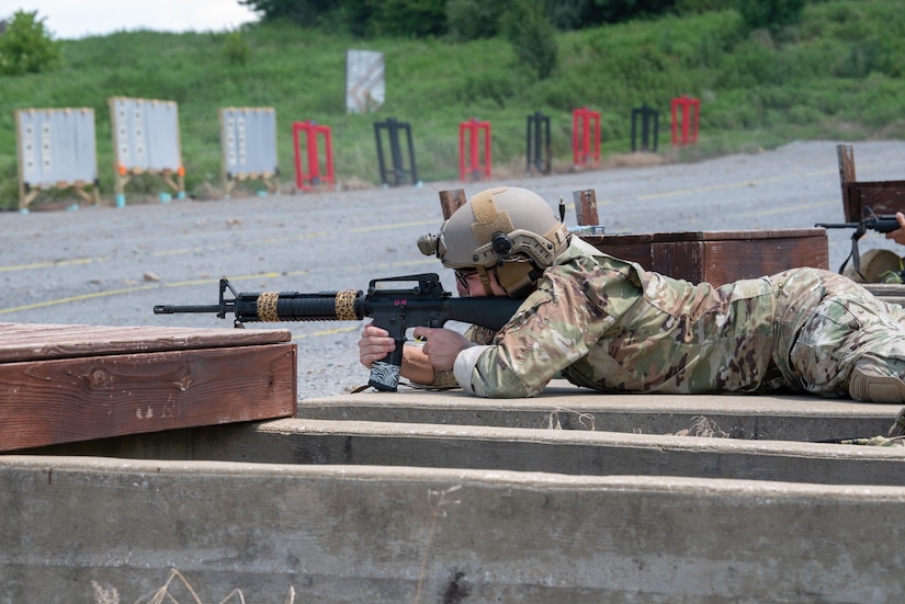 Airman 1st Class Charles Jenkins of the Kentucky Air National Guard’s 123rd Contingency Response Group aims an M16A4 rifle while prone July 12, 2025, during the Adjutant General’s Match, a marksmanship competition held at the Wendell H. Ford Regional Training center in Greenville, Ky. The event tested Soldiers and Airmen with realistic, combat-focused shooting scenarios designed to sharpen weapons proficiency and lethality. (U.S. Air National Guard photo by Airman 1st Class Angelee Barnett)