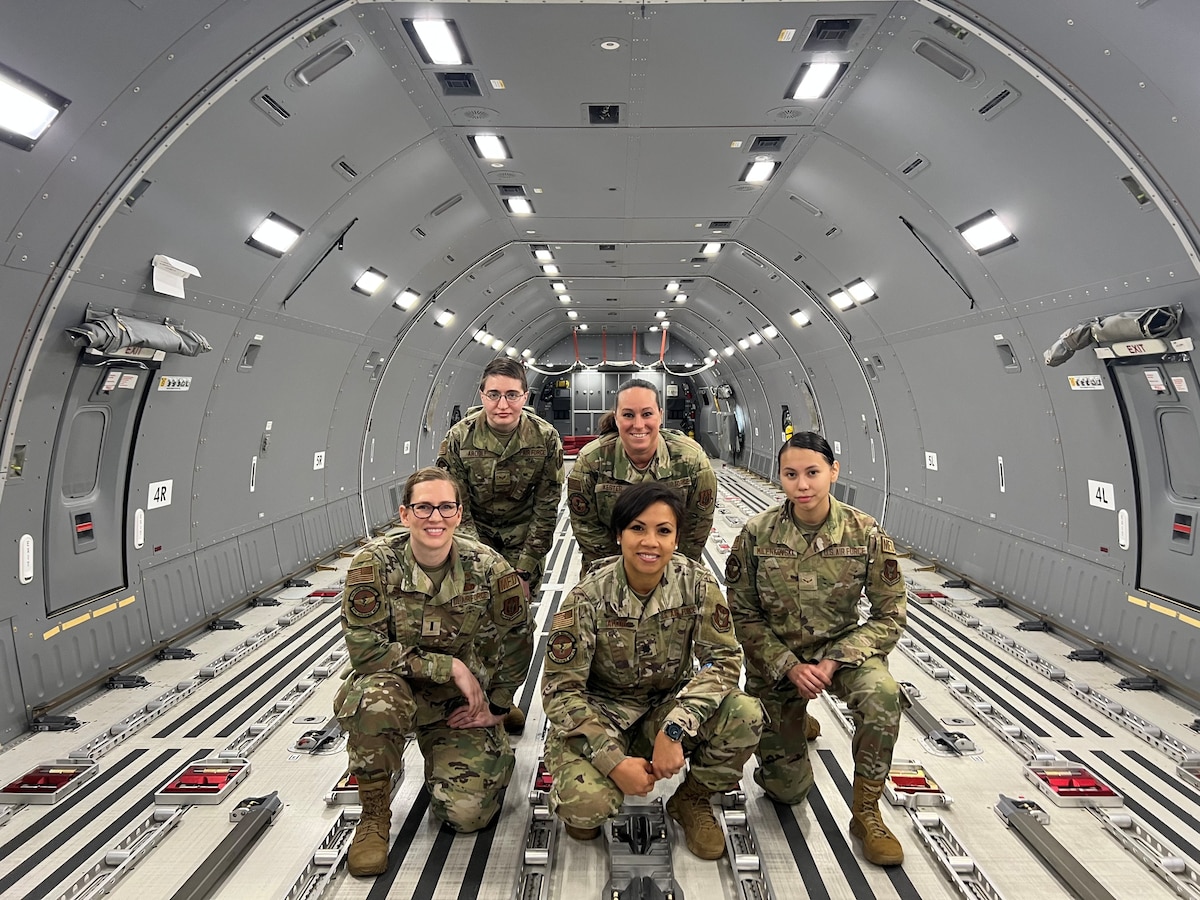 Image of Airmen posing for a photo.