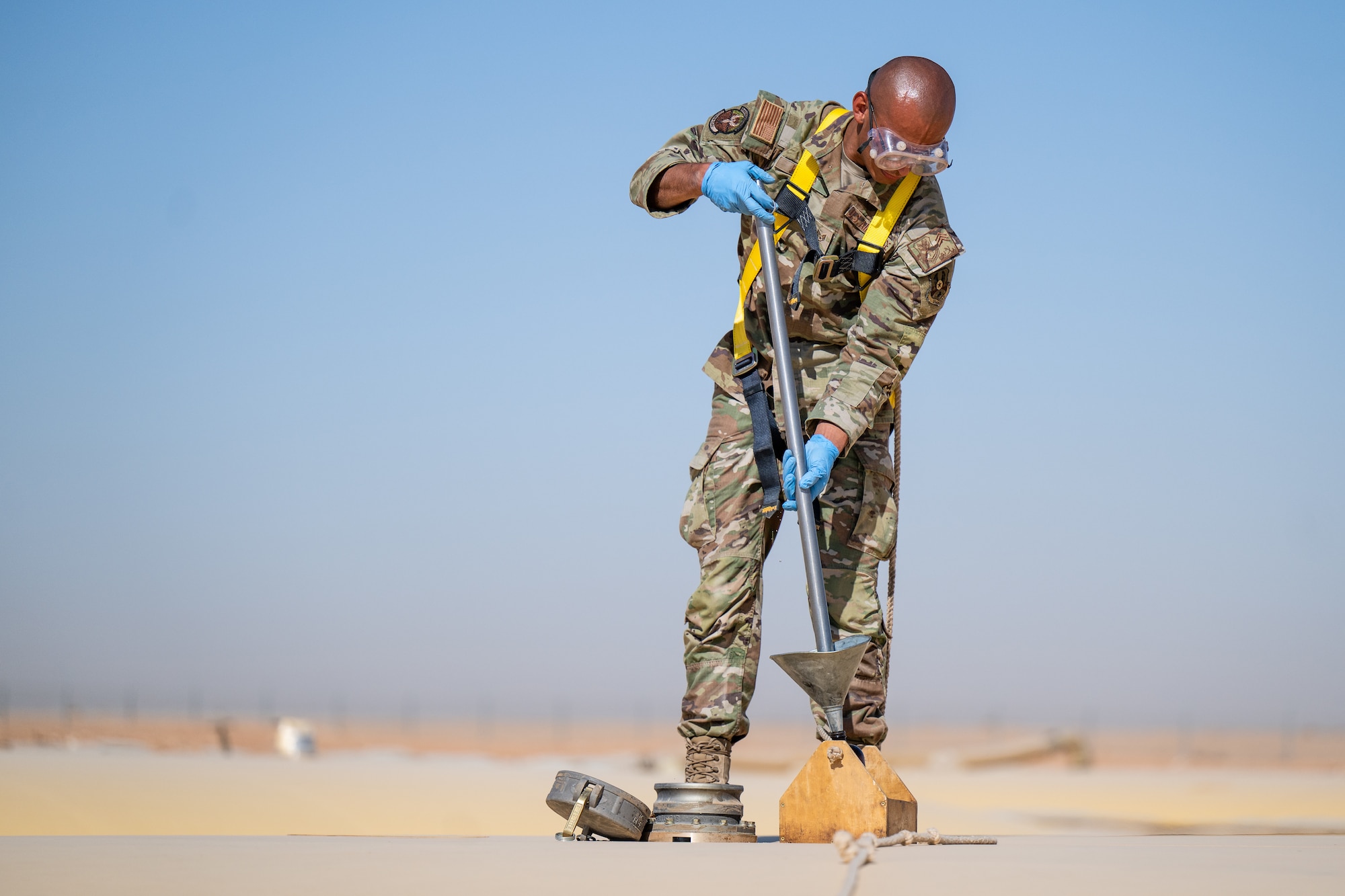 U.S. Air Force Staff Sgt. Fabian Pelayo, 378th Expeditionary Logistics Readiness Squadron fuels laboratory technician, tests fuel samples