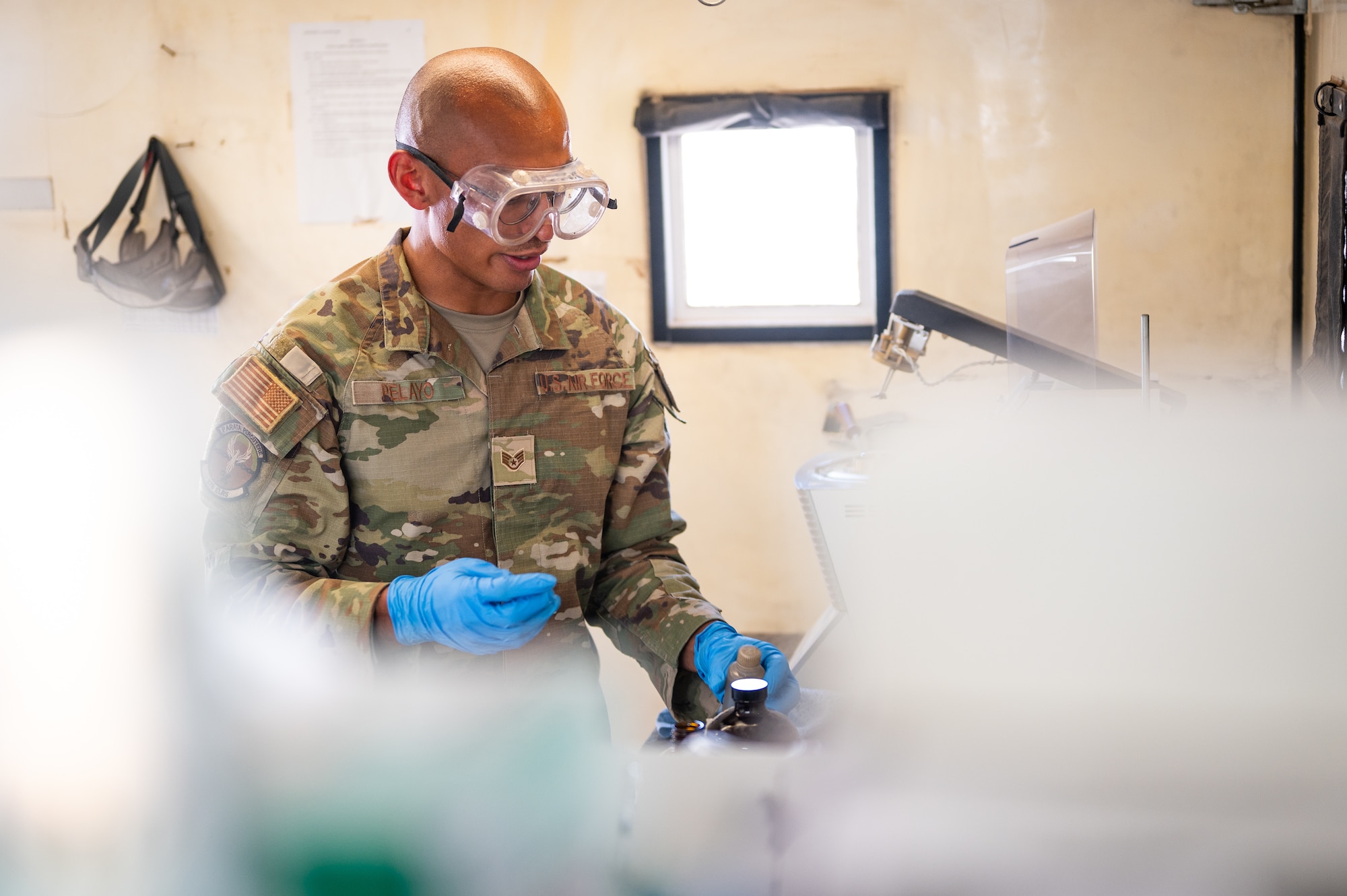 U.S. Air Force Staff Sgt. Fabian Pelayo, 378th Expeditionary Logistics Readiness Squadron fuels laboratory technician, tests fuel samples