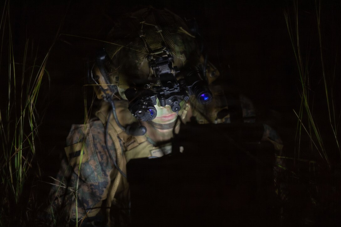 U.S. Marine Corps 1st Lt. Jacob Meyer, executive officer of Kilo Company, Battalion Landing Team 3rd Battalion, 1st Marine Regiment, 31st Marine Expeditionary Unit, monitors a computer display during a mechanized raid on Camp Hansen, Okinawa, Japan, Dec. 05, 2025. The raid was conducted to enhance efficiency and efficacy of ship-to-shore operations utilizing mechanized assets. The 31st MEU, the Marine Corps’ only continuously forward-deployed MEU, provides a flexible and lethal force ready to perform a wide range of military operations as the premiere crisis response force in the Indo-Pacific region. Meyer is a native of Nebraska. (U.S. Marine Corps photo by Cpl. Maksim Masloboev)