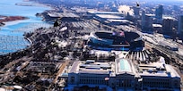 A diamond formation of Illinois Army National Guard helicopters performs a flyover over Soldier Field in Chicago on Dec. 14.