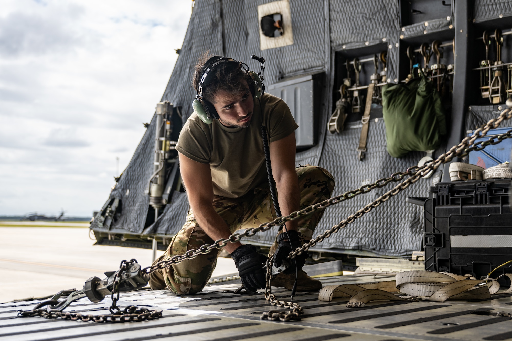 U.S. Air Force Airmen assigned to the 9th Airlift Squadron and 23rd Logistics Readiness Squadron load cargo from the 38th Rescue Squadron into a C-5M Super Galaxy at Moody Air Force Base, Georgia, Oct. 3, 2025.