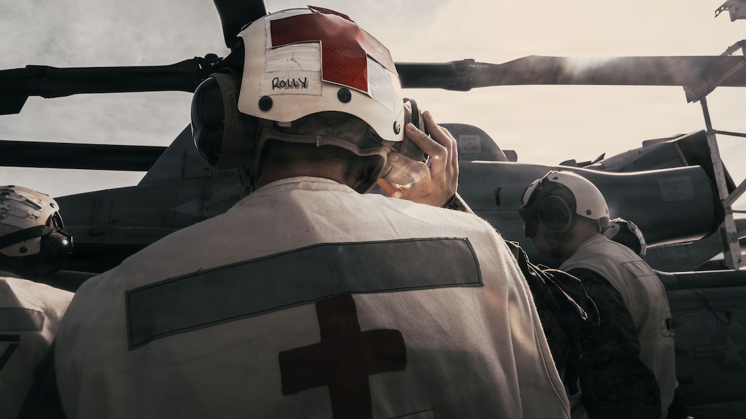 U.S. Marines and Navy Sailors with the 31st Marine Expeditionary Unit, prepare to conduct Tactical Combat Casualty Care on a simulated casualty aboard the forward-deployed amphibious assault carrier USS Tripoli (LHA 7), flagship of the Tripoli Expeditionary Strike Group, Dec. 6, 2025, while conducting routine operations in the U.S. 7th Fleet Area of Operations. The 31st MEU, the Marine Corps’ only continuously forward-deployed MEU, provides a flexible and lethal force ready to perform a wide range of military operations as the premiere crisis response force in the Indo-Pacific region. (U.S. Marine Corps photo by Lance Cpl. Raul Sotovilla)
