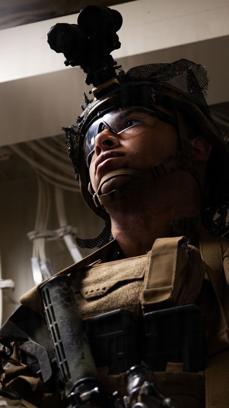 A U.S. Marine with Weapons Company, Battalion Landing Team 3rd Battalion, 1st Marine Regiment, 31st Marine Expeditionary Unit, conducts gear checks aboard the forward-deployed amphibious assault carrier USS Tripoli (LHA 7), flagship of the Tripoli Expeditionary Strike Group, Dec. 3, 2025, while conducting routine operations in the U.S. 7th Fleet Area of Operations. Marines conducted call away drills in order to sustain mission capabilities in support of the 31st MEU. The 31st MEU, the Marine Corps’ only continuously forward-deployed MEU, provides a flexible and lethal force ready to perform a wide range of military operations as the premiere crisis response force in the Indo-Pacific region. (U.S. Marine Corps photo by Lance Cpl. Raul Sotovilla)