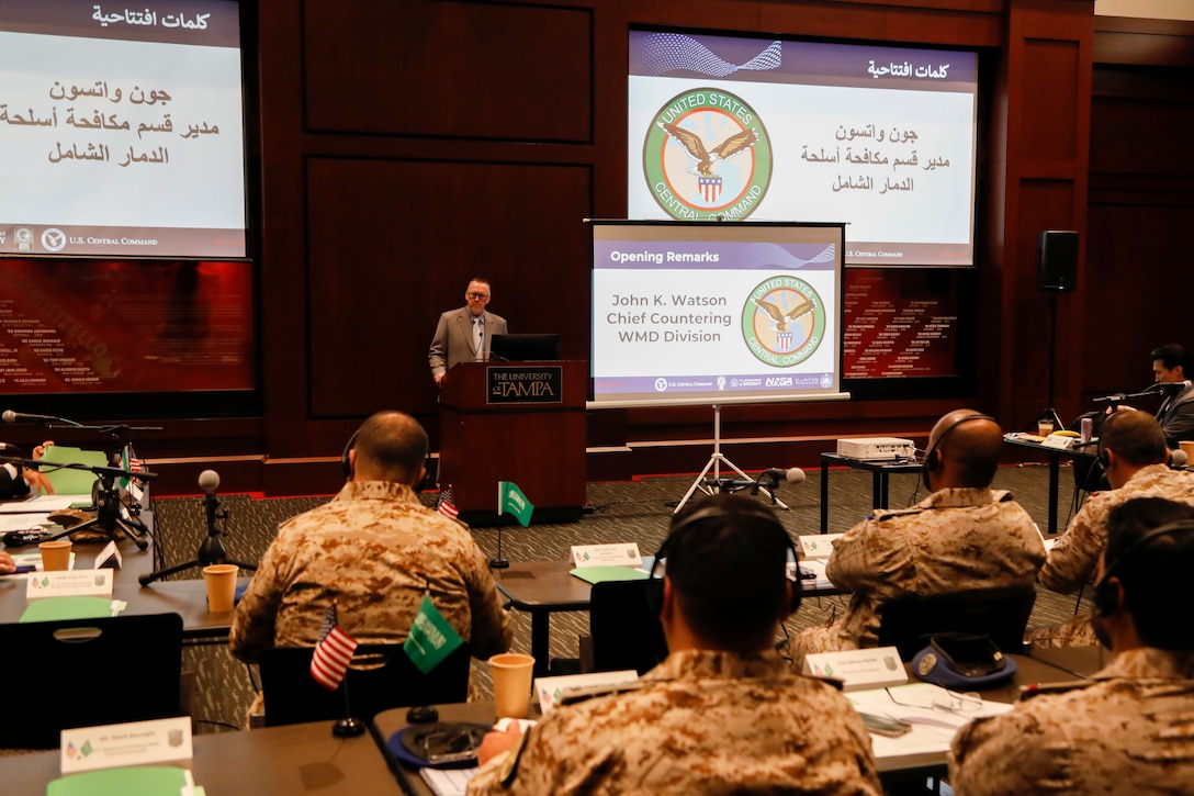 U.S. Central Command (CENTCOM) CCJ5 Countering Weapons of Mass Destruction (WMD) Division Chief, John K. Watson, delivers opening remarks during tabletop exercise Protection Shield at the University of Tampa, Dec. 8, 2025. CENTCOM, Department of Energy, Department of State, University of Tampa, and the Kingdom of Saudi Arabia Ministry of Defense, Ministry of Health, and Red Crescent participated in the consequence management tabletop exercise that aims to prevent, protect, and respond to incidents while improving interagency operability. (U.S. Central Command Public Affairs photo by Tom Gagnier)