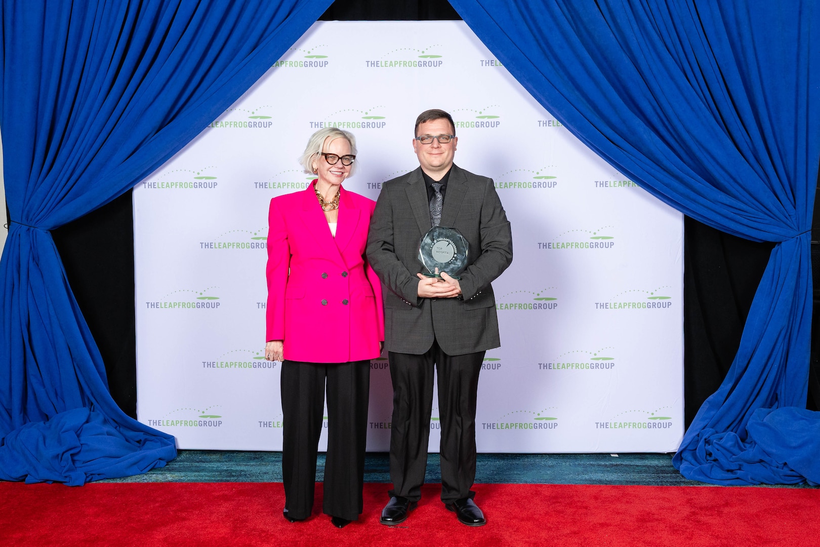 Mr. Collin Speed, Patient Safety Manager, Keller Army Community Hospital, displays The Leapfrog Group '2025 Top General Hospital' award with Ms. Lea Binder, President and CEO, The Leapfrog Group.