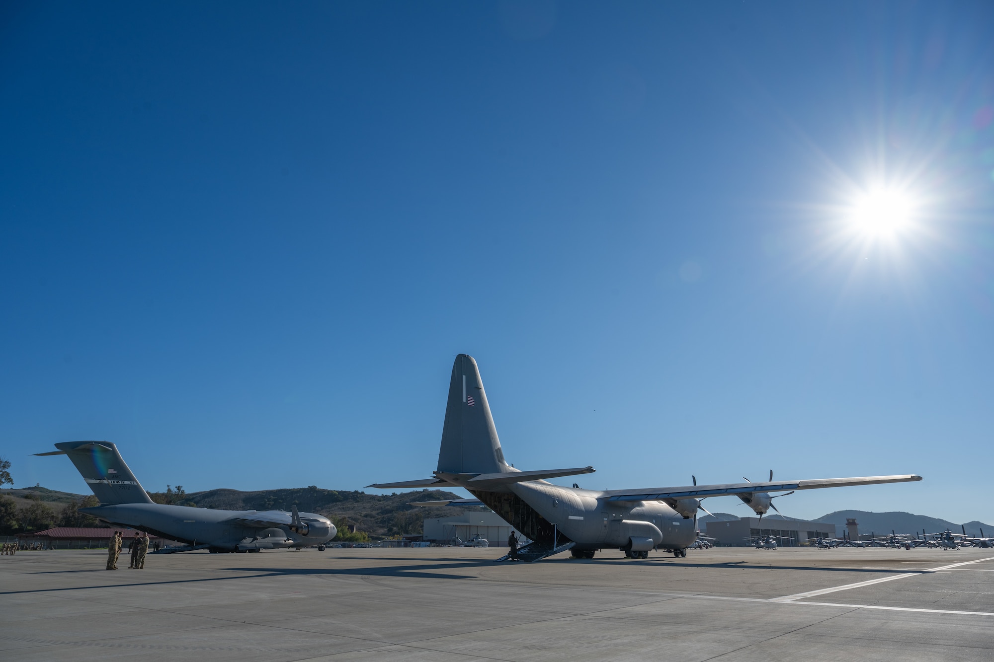 Marines board a C-130J Super Hercules