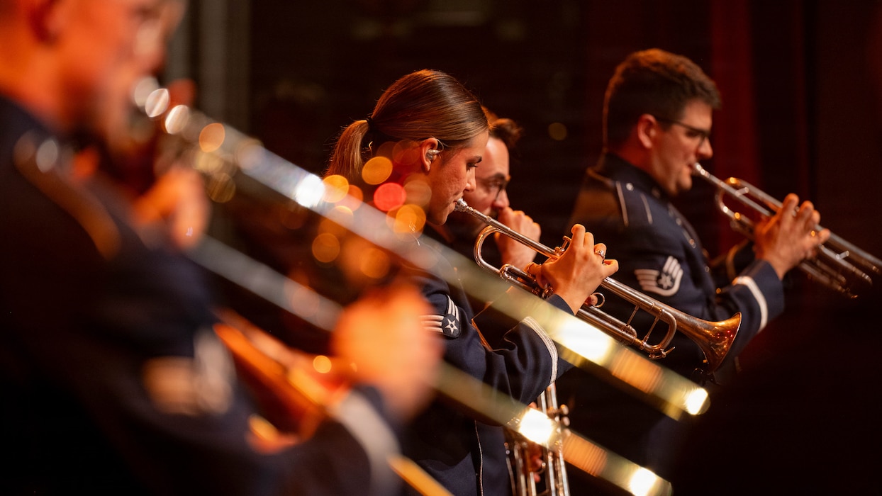 Brass players play in line together