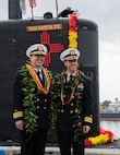 (Sept. 29, 2025) Cmdr. Eric Knepper, commanding officer of the Los Angeles-class fast-attack submarine USS Santa Fe (SSN 763), left and Cmdr. Sean Heenan, executive officer of Santa Fe, pose for a photo after returning to Naval Base Point Loma following a six-month deployment to the U.S. Indo-Pacific Command area of responsibility, Sept. 29, 2025. Santa Fe is assigned to Commander, Submarine Squadron 11, home to four Los Angeles-class fast-attack submarines, which are capable of supporting various missions, including anti-submarine warfare, anti-ship warfare, strike warfare and intelligence, surveillance and reconnaissance. (U.S. Navy photo by Mass Communication Specialist 2nd Class Rashan Jefferson)