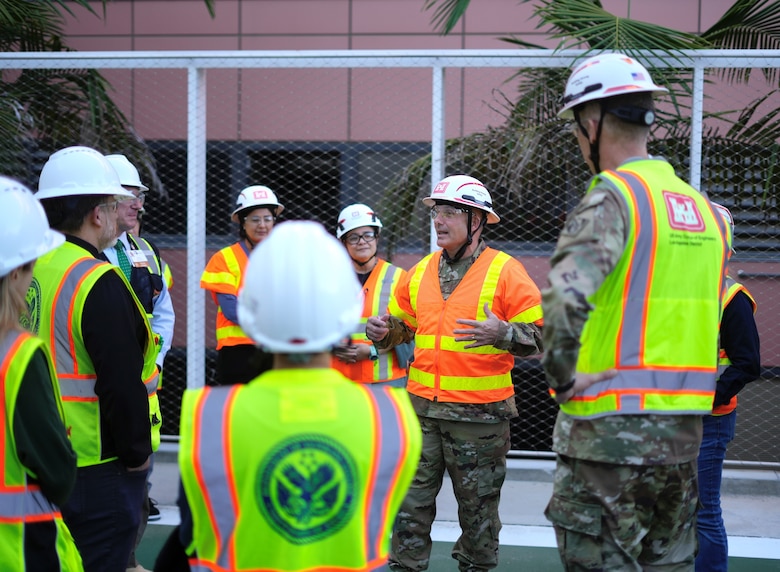 Brig. Gen. John Lloyd, U.S. Army Corps of Engineers South Pacific Division commander, second from right, talks with USACE Los Angeles District project-delivery team members and Department of Veterans Affairs project partners Dec. 3 at the Jennifer Moreno VA Medical Center campus in San Diego during his tour of the nearly complete San Diego VA Healthcare System Spinal Cord Injury/Community Living Center.