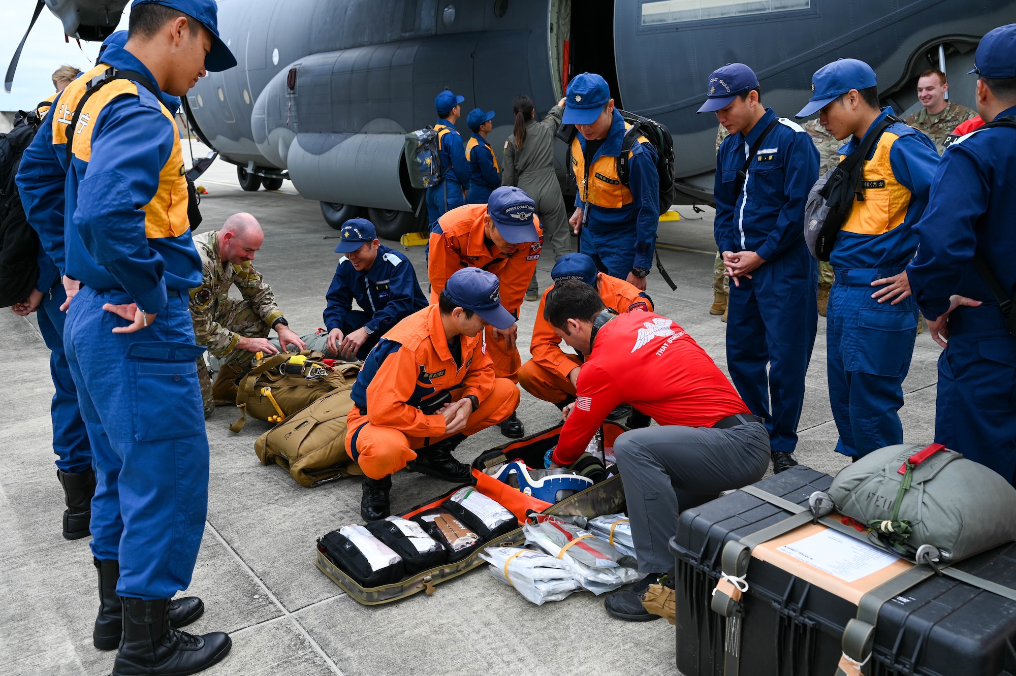 Service member showcase gear to local coast guard.