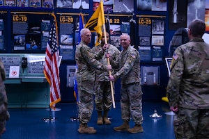 U.S. Space Force Col. Ryan Hiserote assumes command of System Delta 80 from Lt. Gen. Philip Garrant during a stand-up ceremony at Cape Canaveral Space Force Station, Fla., Dec. 12. SYD 80 will procure, integrate, and execute launch solutions, on-orbit servicing, and range systems. (U.S. Space Force photo/SrA Samuel Becker)