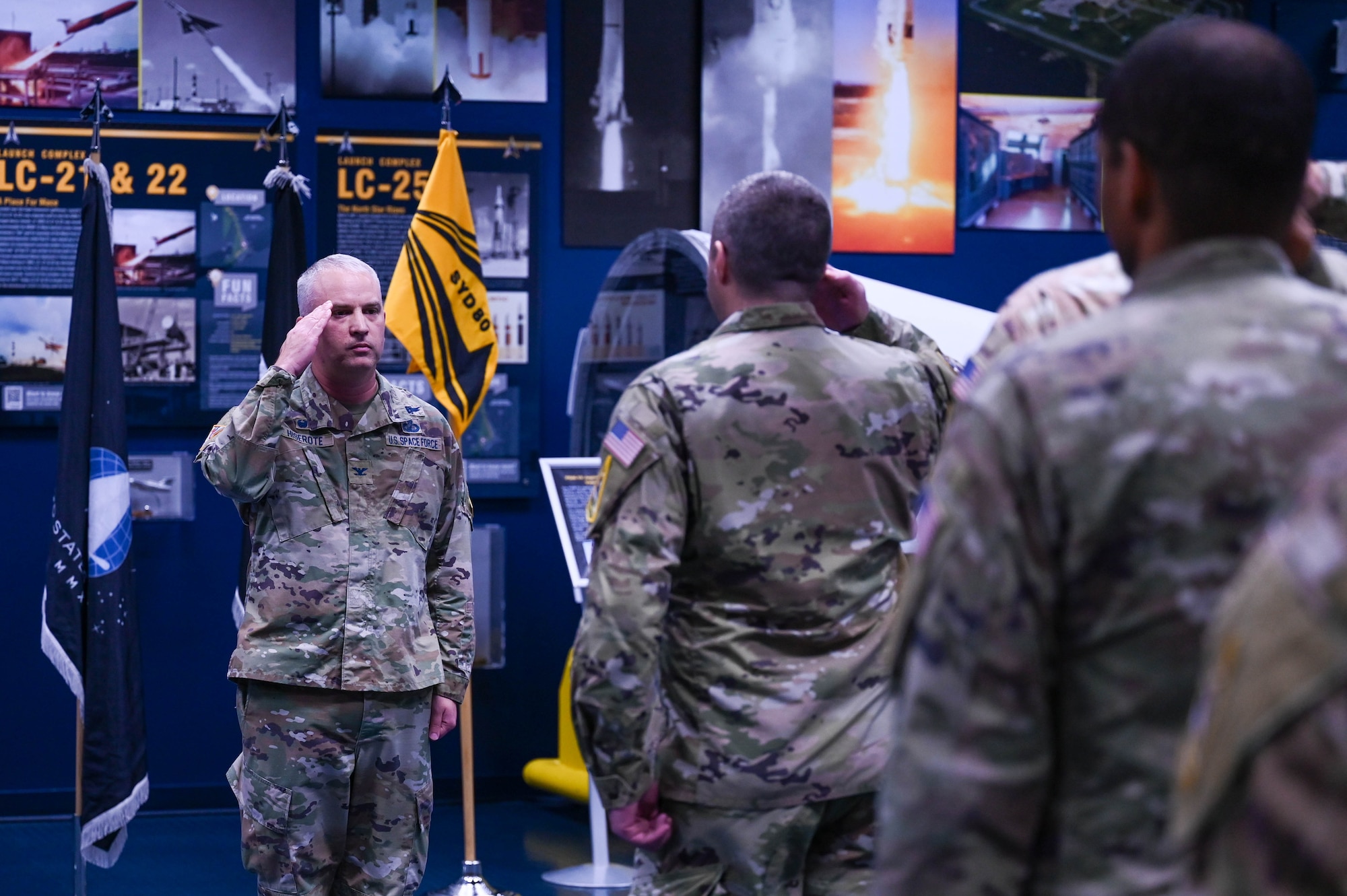 U.S. Space Force Col. Ryan Hiserote returns a salute from System Delta 80 (SYD 80) personnel during the SYD 80 stand-up ceremony at Cape Canaveral Space Force Station, Fla., Dec. 12. SYD 80 officially stood up on Oct. 7 and will ensure mobility in, from, and to space. (U.S. Space Force photo/SrA Samuel Becker)