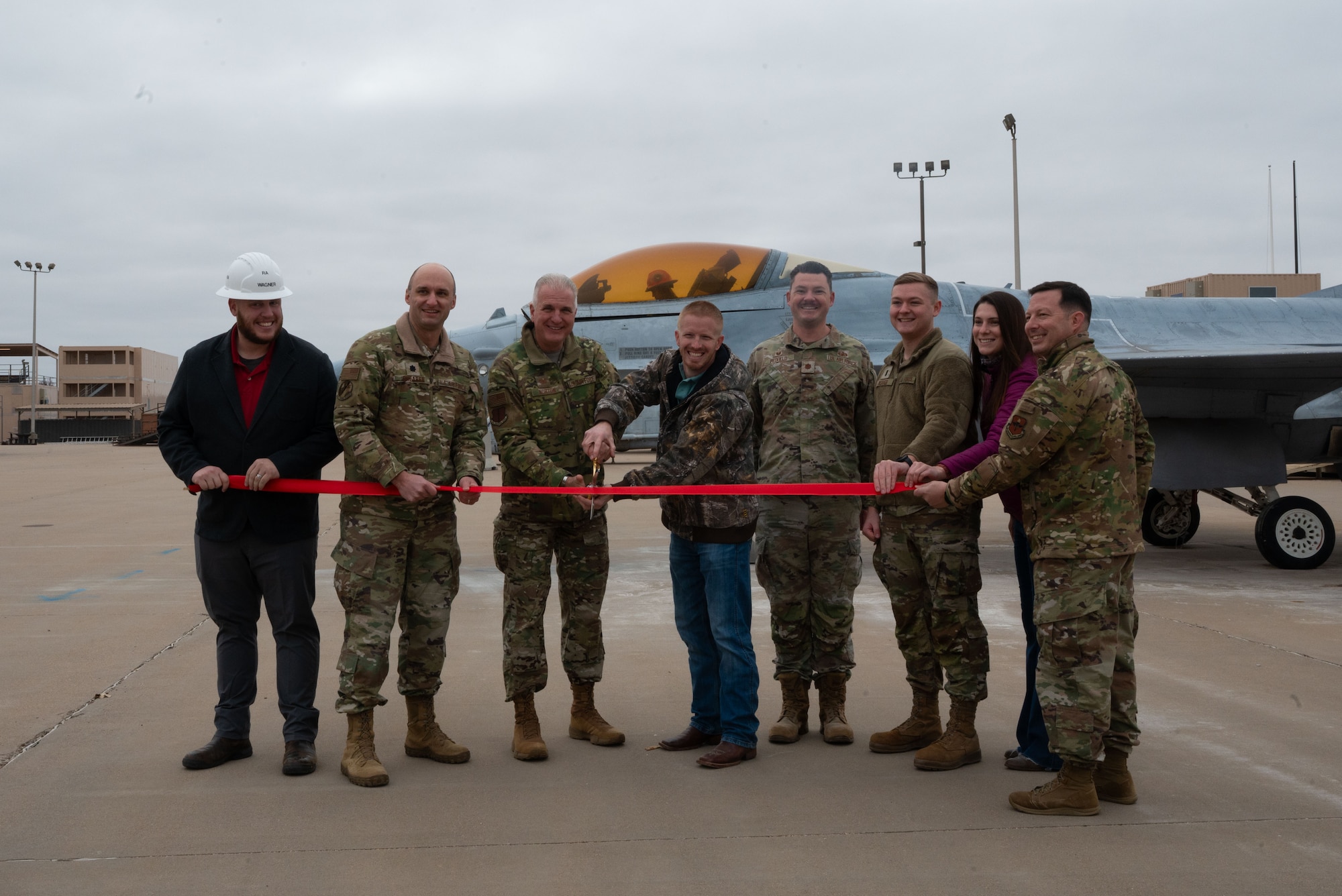 Goodfellow Air Force Base commander and the county judge, also an honorary commander, cut the ribbon during the unveiling ceremony.