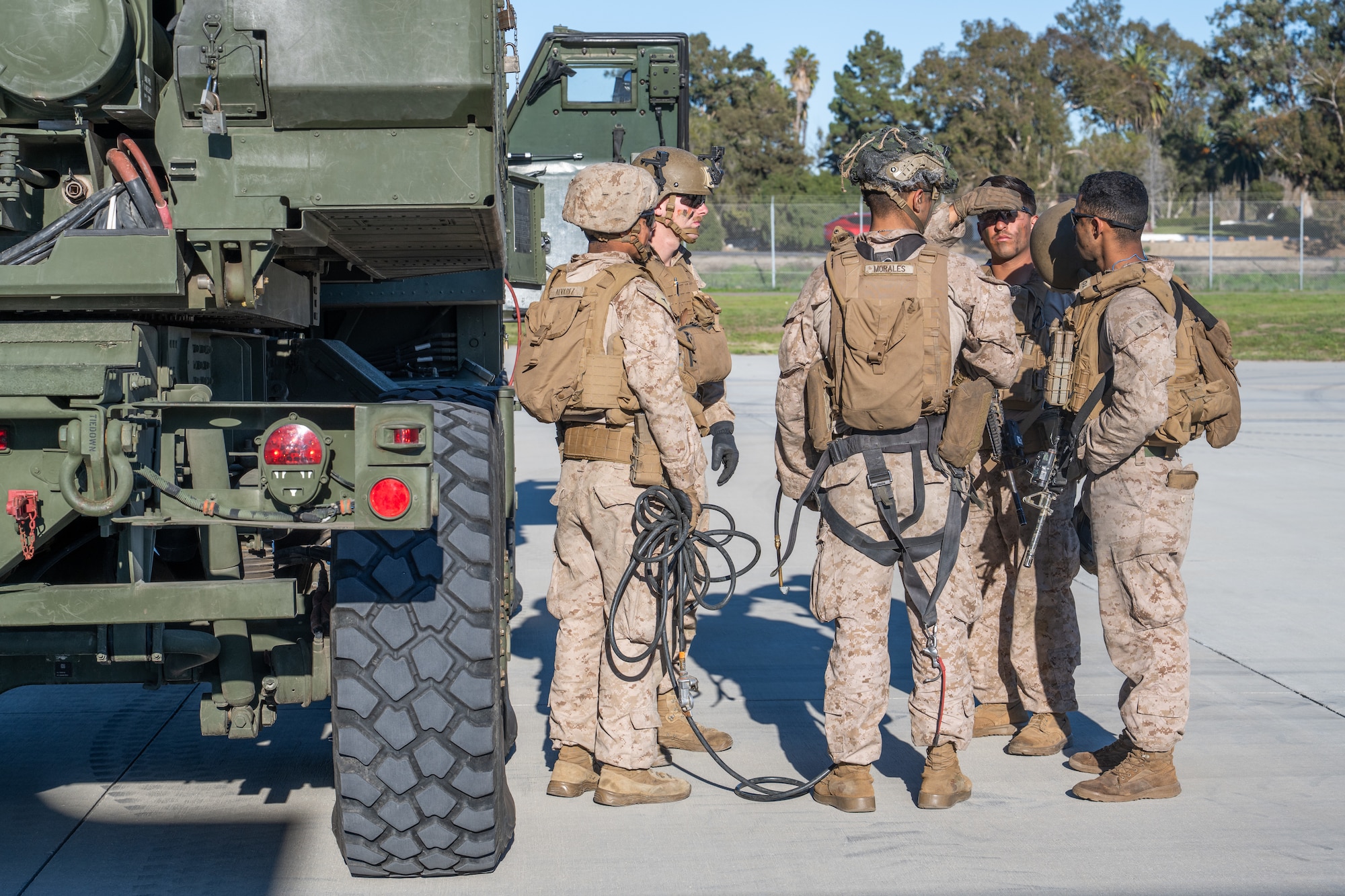Marines board a C-130J Super Hercules
