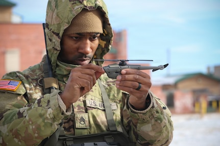 U.S. Army infantry cadre assigned to 1st Battalion, 166th Regiment – Regional Training Institute, Pennsylvania Army National Guard conduct Soldier Borne Sensor (SBS) training at Fort Indiantown Gap Dec. 9–11, 2025, as part of ongoing efforts to modernize small-unit reconnaissance and prepare instructors for future unmanned aircraft system integration. (U.S. Army National Guard photo by Sgt. 1st Class Shane Smith)