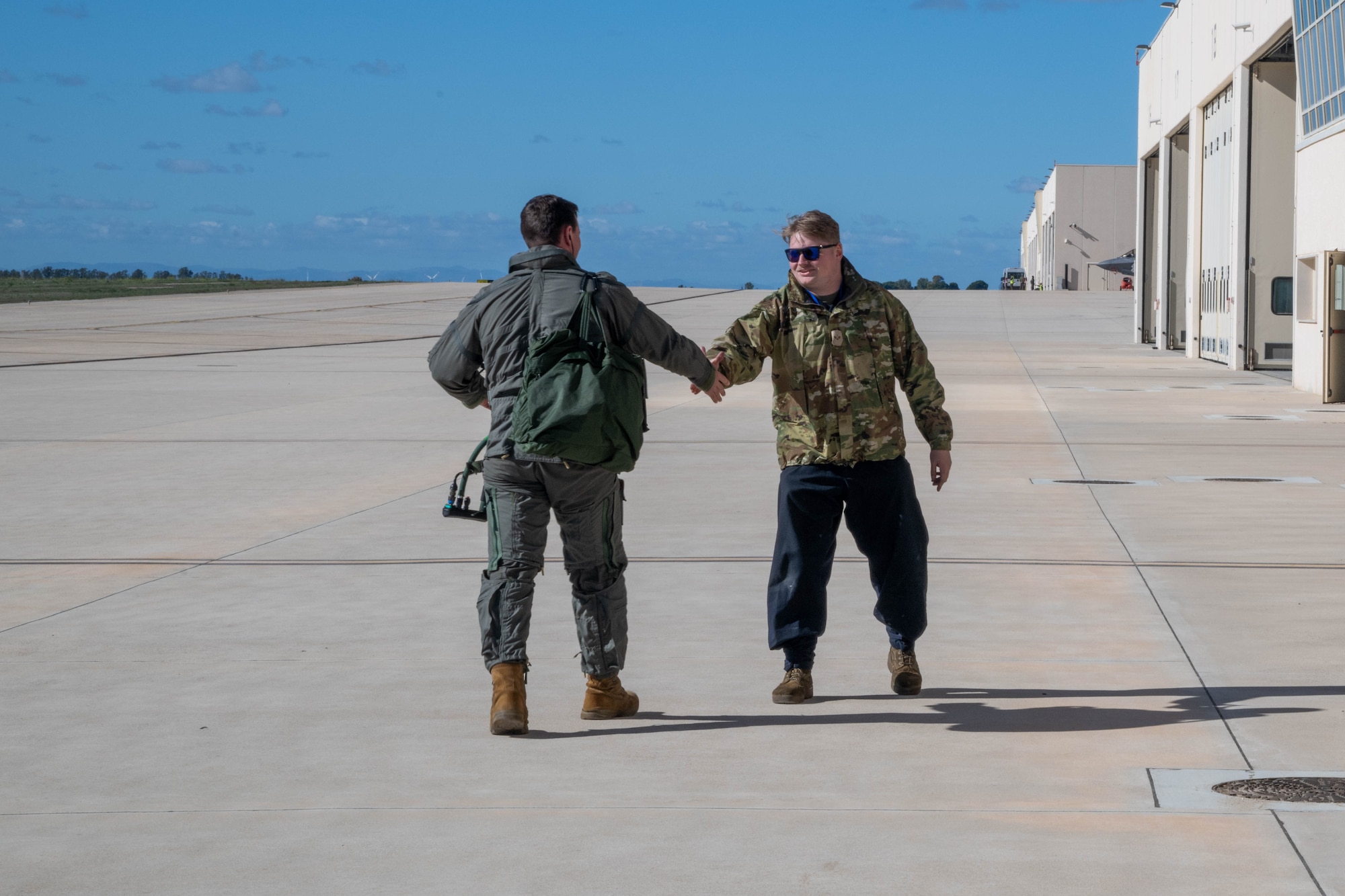 pilot greets crew chief