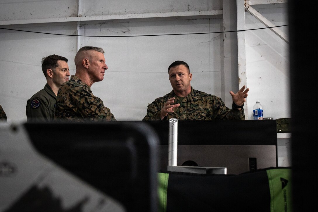 The 39th Commandant of the Marine Corps, Gen. Eric M. Smith, left, is briefed by the maintenance control officer-in-charge of Marine Fighter Attack Squadron (VMFA) 225, U.S. Marine Corps Forces, South, at Jose Aponte de la Torre Airport in Ceiba, Puerto Rico, Dec. 16, 2025. U.S. military forces are deployed to the Caribbean in support of the U.S. Southern Command mission, Department of War-directed operations, and the president’s priorities to disrupt illicit drug trafficking and protect the homeland. (U.S. Marine Corps photo)