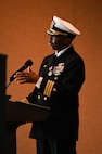 U.S. Navy Cmdr. Joseph Brisco, Naval Consolidated Brig Charleston outgoing commanding officer, gives thanks to his support system during the NCBC change of command ceremony.