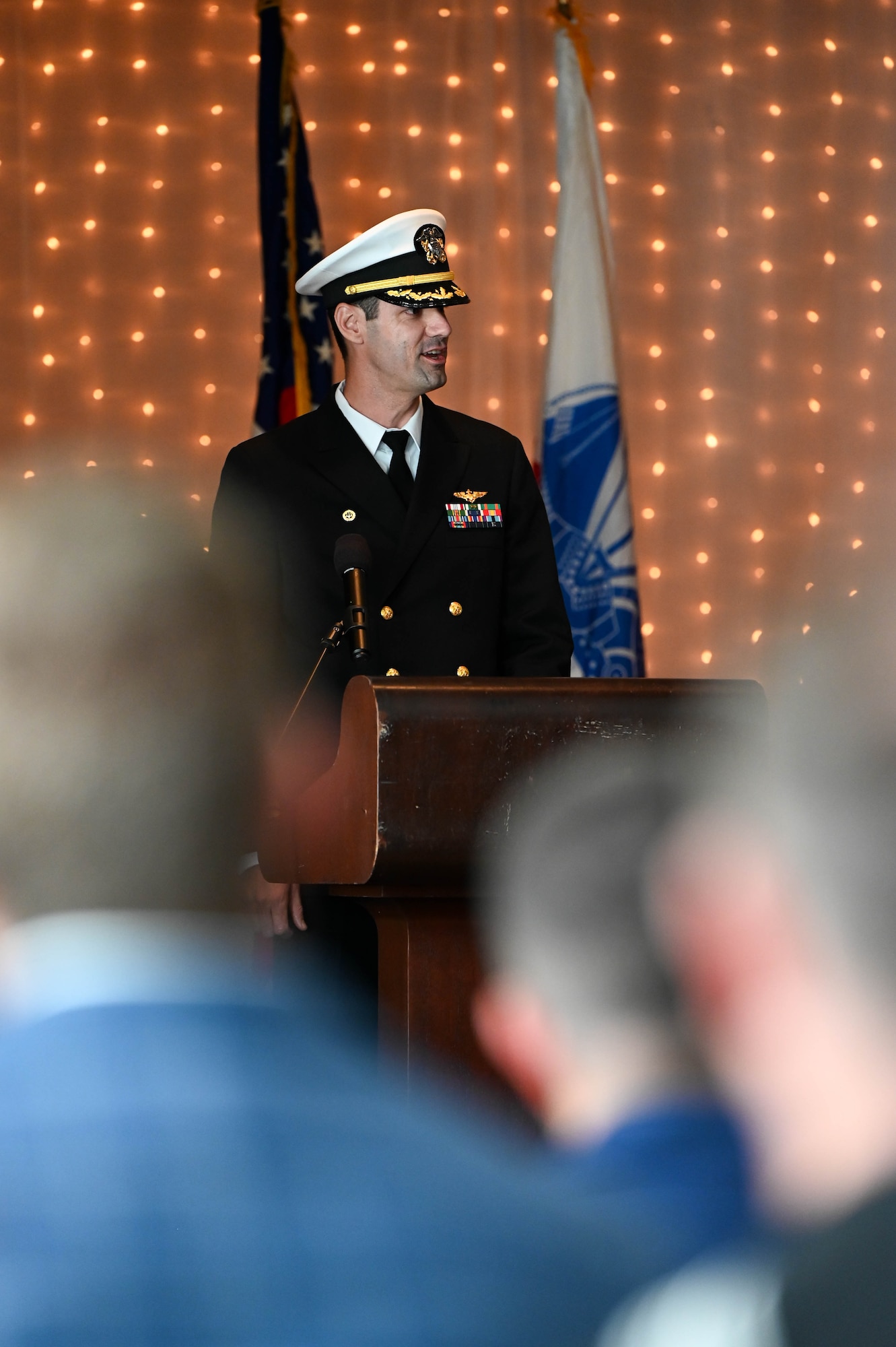 U.S. Navy Cmdr. Kevin Howard, Naval Consolidated Brig Charleston commanding officer, expresses his gratitude to the chain of command during the NCBC change of command ceremony.
