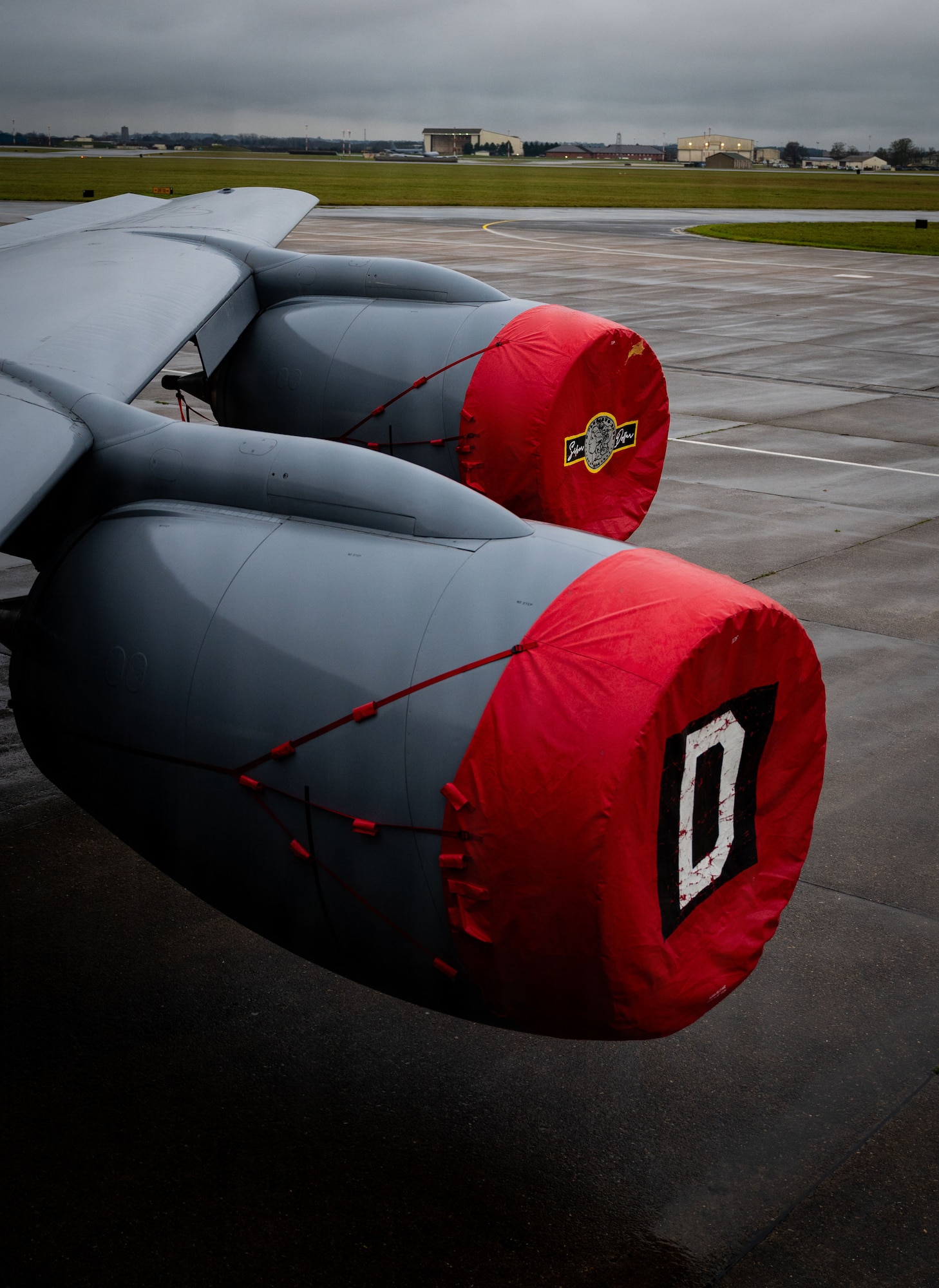 Covered engines of a KC-135 Stratotanker assigned to the 100th Air Refueling Wing are on display during a professional staff member of the Senate Armed Services Committee visit at RAF Mildenhall, England, Dec. 16, 2025.