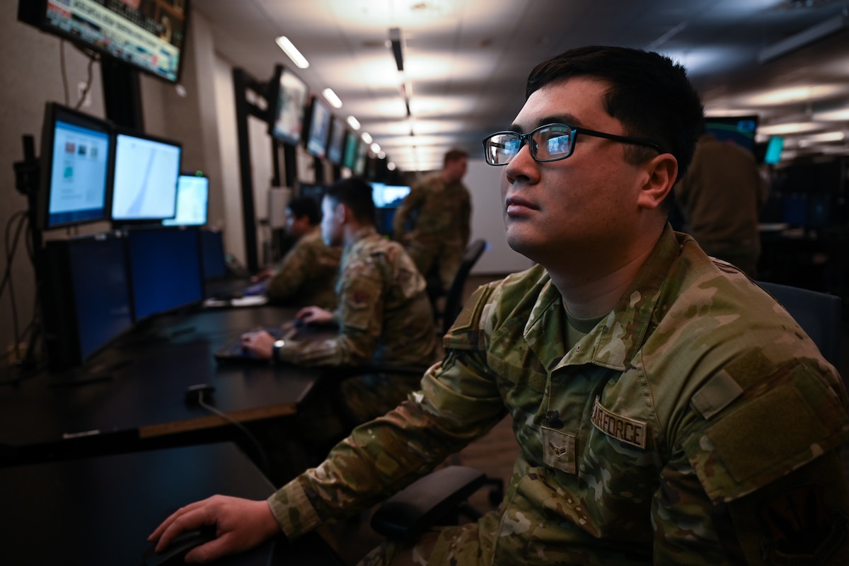Airman working at a computer