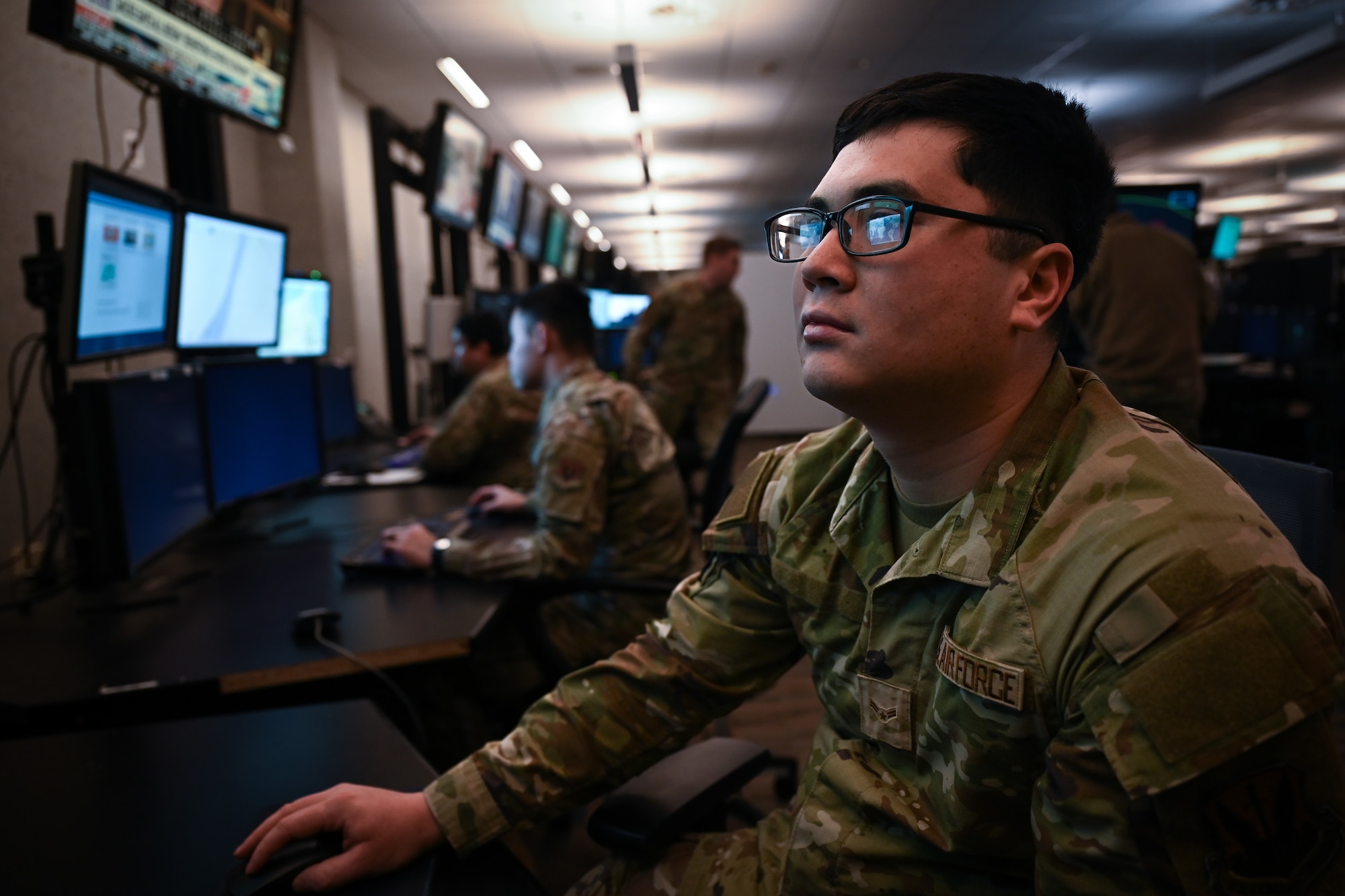 Airman working at a computer