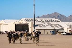 U.S. Air Force Airmen return from a deployment with the 11th Air Task Force at Davis-Monthan Air Force Base, Arizona, Dec. 17, 2025. The 11th ATF tackled missions in Saipan, the Republic of Korea and Guam during its inaugural deployment. (U.S. Air Force photo by Airman 1st Class Samantha Melecio)