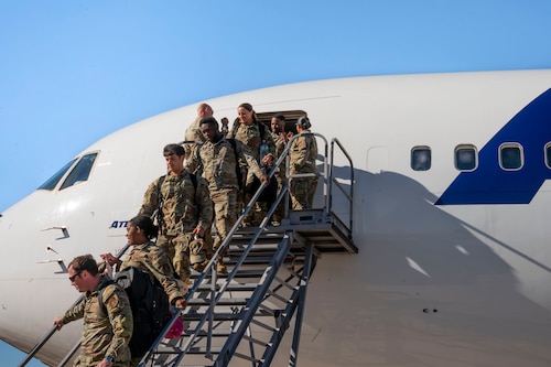 U.S. Air Force Airmen return from a deployment with the 11th Air Task Force at Davis-Monthan Air Force Base, Arizona, Dec. 17, 2025. Airmen returned from a five-month deployment to support the 11th ATF’s inaugural deployment. (U.S. Air Force photo by Airman 1st Class Samantha Melecio)