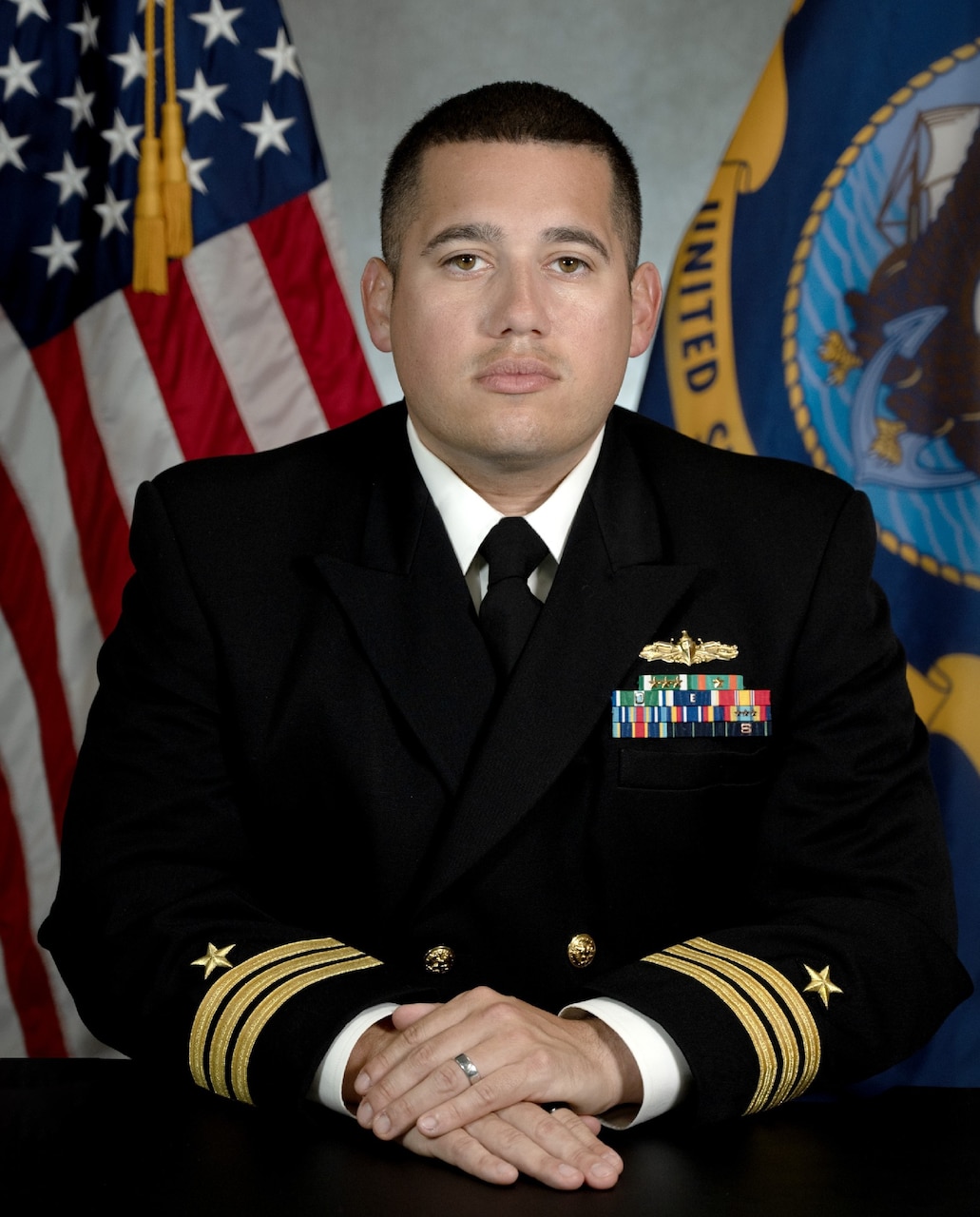 Commander David J. Melendez