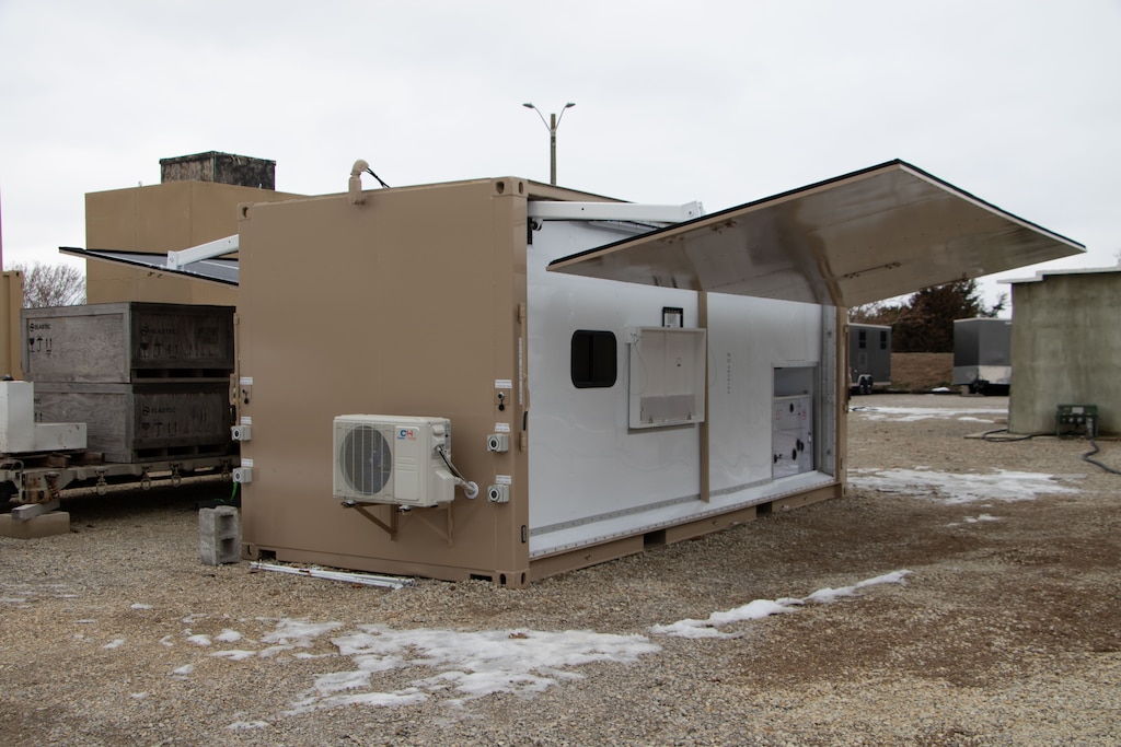 The energy node, with photovoltaic (PV) panels fully deployed, at the ERDC Forward Operating Base Laboratory in Champaign, Illinois.