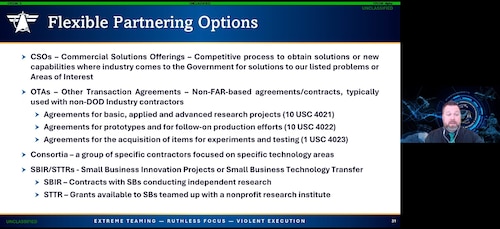 Chris Molis speaks to attendees during the Department of the Air Force Program Executive Office for Command, Control, Communications and Battle Management’s virtual Engagement Day, here, Dec. 11, 2025. Molis is the Contracts technical director for PEO C3BM. Engagement Day provides the opportunity for attendees to learn about the organization’s mission and how to collaborate with the PEO and its partner services. (Official Air Force Screenshot by Morgan Brown).