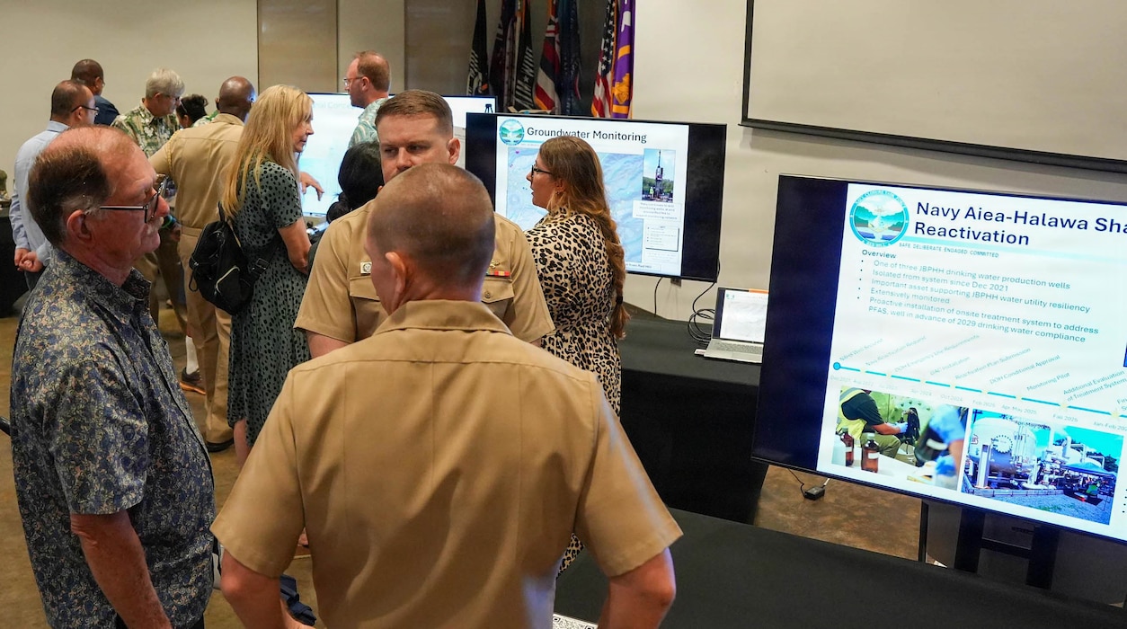 Members of Navy Closure Task Force-Red Hill (NCTF-RH) and the University of Hawaii speak with community members during the NCTF-RH open house held at the Oahu Veterans Center in Honolulu, Dec. 11, 2025. NCTF-RH hosted the quarterly open house for members of the community to learn about current and future efforts in support of the Red Hill Bulk Fuel Storage Facility (RHBFSF) decommissioning and the Navy’s ongoing environmental efforts. NCTF-RH was established by the Department of the Navy to safely decommission the RHBFSF and emphasize the Navy's commitment to the community and the environment. NCTF-RH continues to engage with the people of Hawaii, regulatory agencies, and other stakeholders as it safely and deliberately decommissions the RHBFSF. (U.S. Navy photo by Mass Communication Specialist 1st Class Glenn Slaughter)