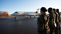 Team Minot leadership salutes the taxiing aircraft carrying U.S. Navy Adm. Rich Correll.