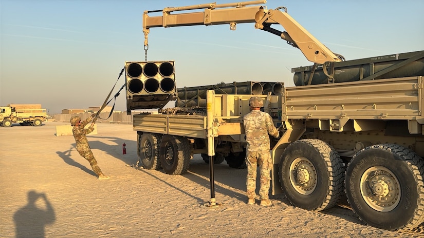 U.S. Army Sgt. Selin Caliskan and Sgt. Christopher Blizzard from the 3rd Battalion, 116th Field Artillery Regiment of the Florida Army National Guard practice ammunition reload operations using the crane on the resupply vehicle during a military occupational specialty transition course at Camp Arifjan, Kuwait, held Oct. 31 through Nov. 16, 2025.