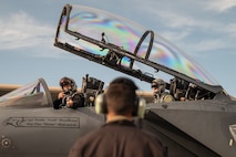 a person looks at a jet