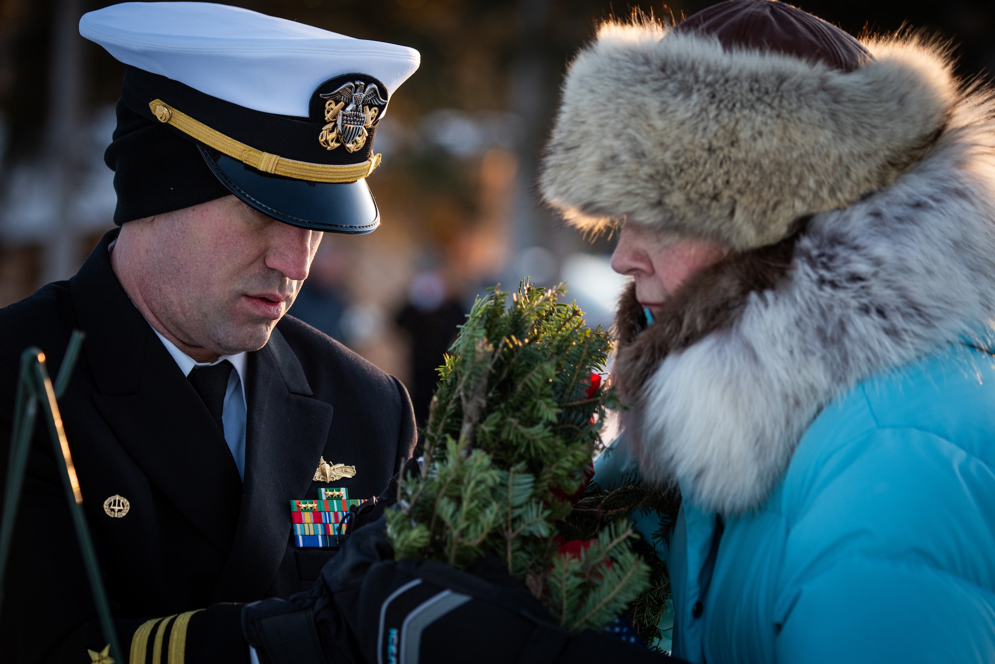 The ceremony opened with the presentation of wreaths honoring service members from every branch of the U.S. military. A member from each branch of service alongside a partner from the Alaska community carefully placed a wreath on display and rendered a salute in memory of their fallen brothers and sisters in arms. Following the presentation, approximately 400 volunteers including families, friends, service members and community members dispersed throughout the cemetery to place wreaths at gravesites, ensuring every hero was honored.