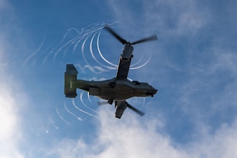 A U.S. Marine Corps MV-22B Osprey with Marine Medium Tiltrotor Squadron (VMM) 163 (Reinforced), 11th Marine Expeditionary Unit, conducts flight operations aboard Wasp-class amphibious assault ship USS Boxer (LHD 4), Dec. 12, 2025.