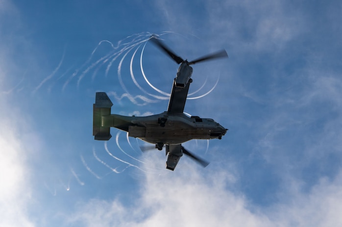 A U.S. Marine Corps MV-22B Osprey with Marine Medium Tiltrotor Squadron (VMM) 163 (Reinforced), 11th Marine Expeditionary Unit, conducts flight operations aboard Wasp-class amphibious assault ship USS Boxer (LHD 4), Dec. 12, 2025.