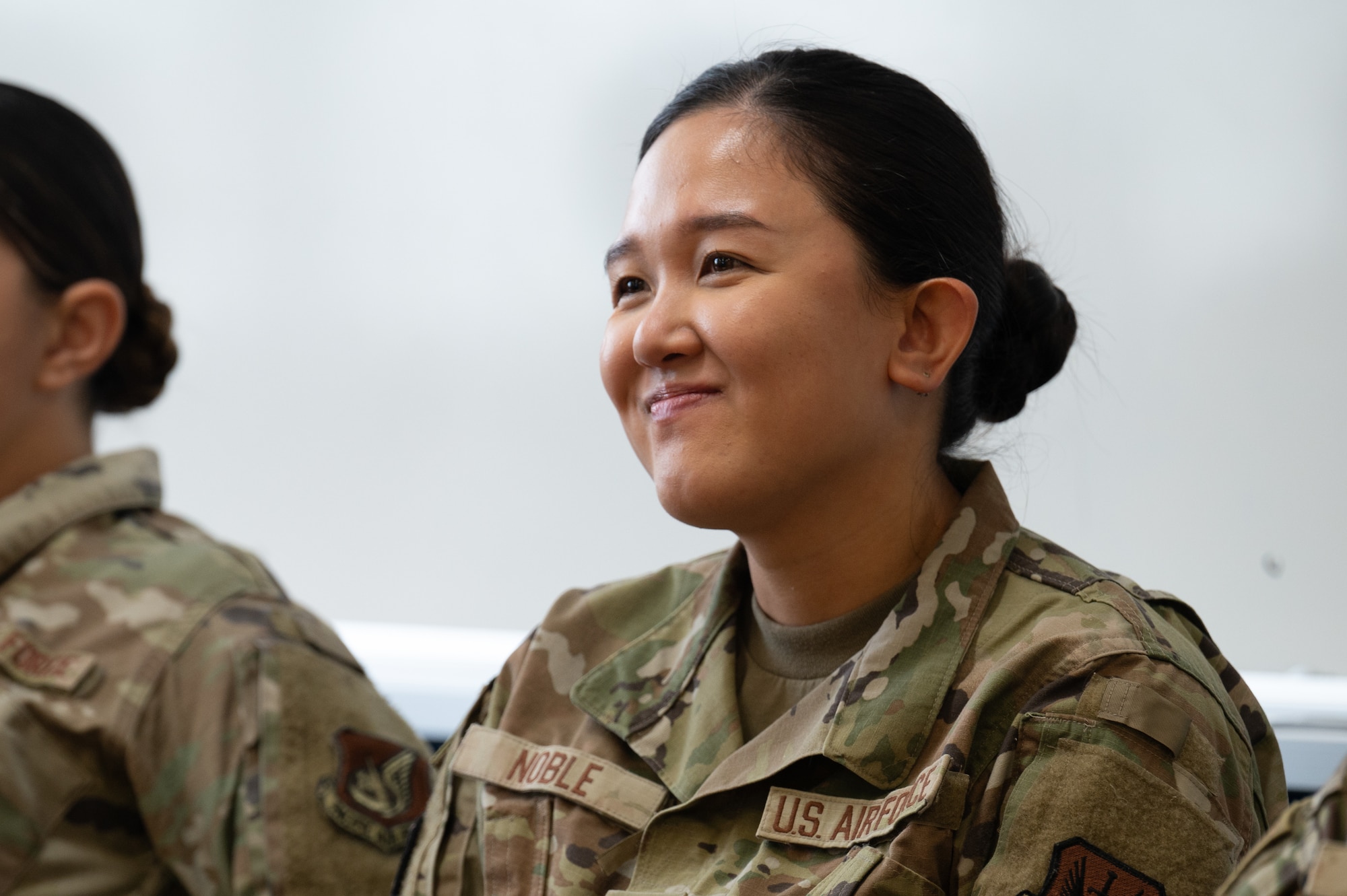 U.S. Air Force Staff Sgt. Maria Abigail Noble, 82nd Reconnaissance Squadron cyber operations technician, participates in a classroom discussion.