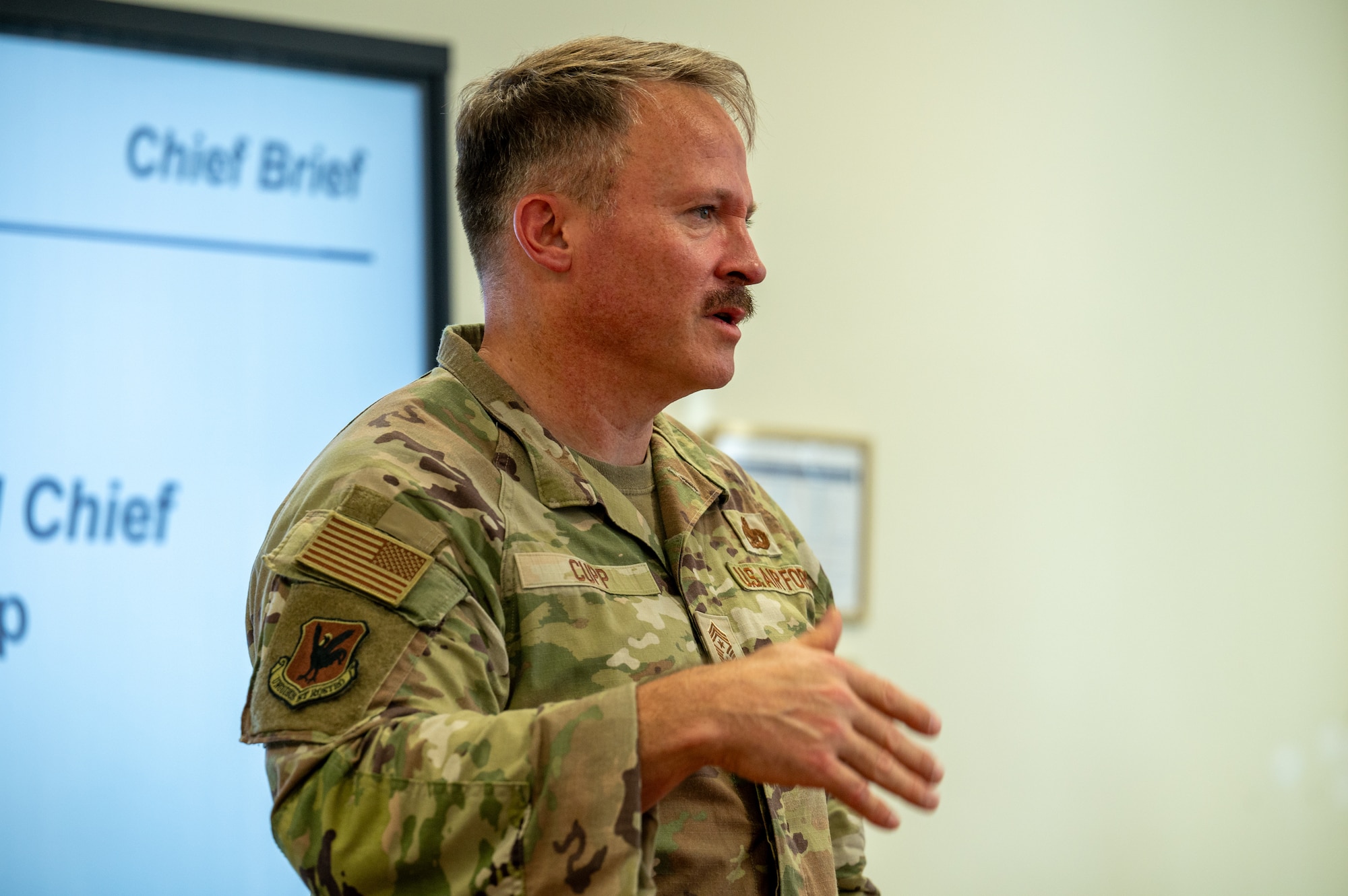 U.S. Air Force Chief Master Sgt. William Cupp, 18th Wing command chief, speaks with newly selected noncommissioned officers.
