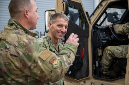 A man in military uniform smiling
