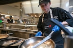 Airman cooking