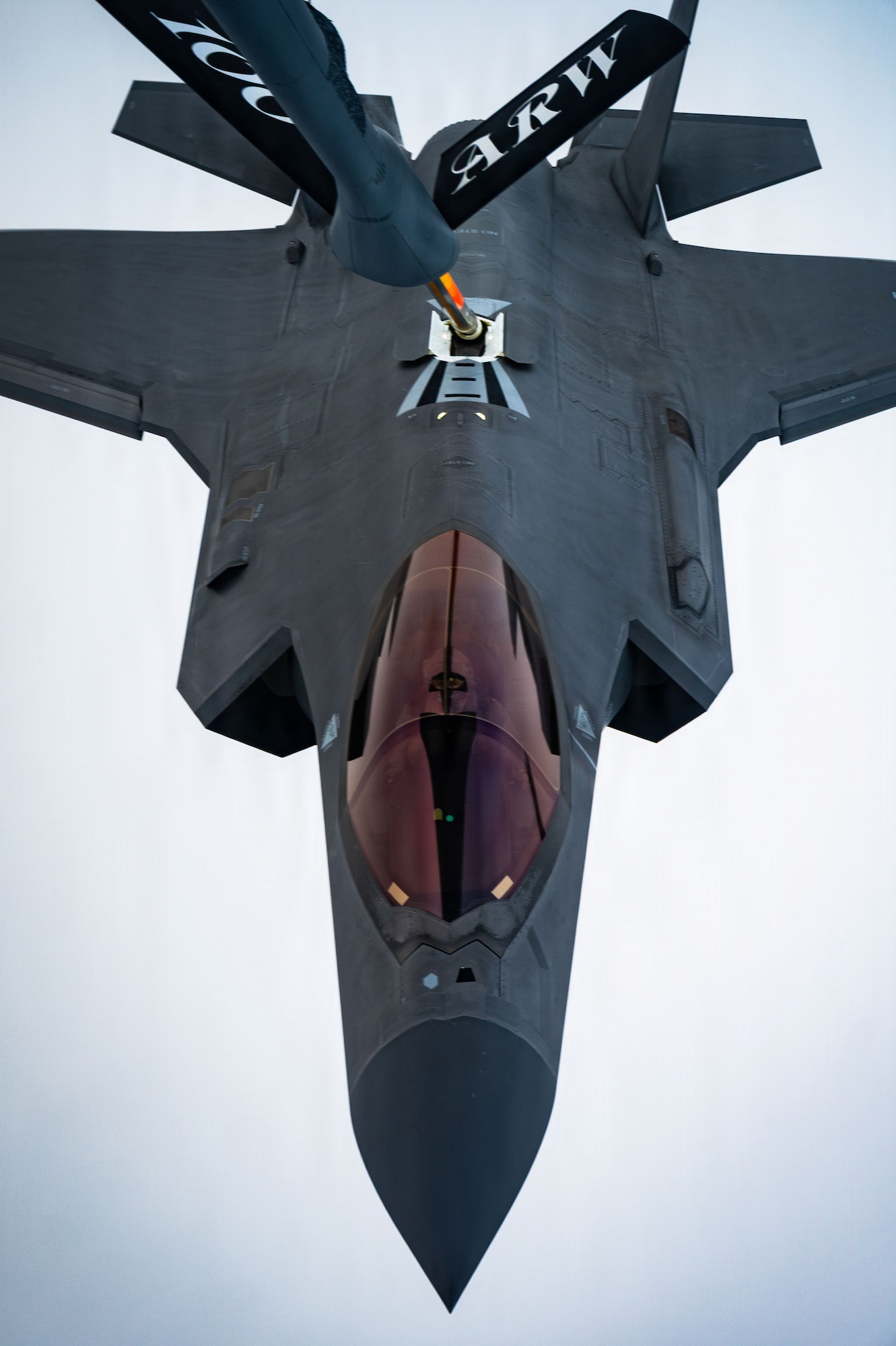 A U.S. Air Force F-35 Lightning II assigned to the 48th Fighter Wing receives fuel from a KC-135 Stratotanker assigned to the 100th Air Refueling Wing, over Poland, Nov. 19, 2025.