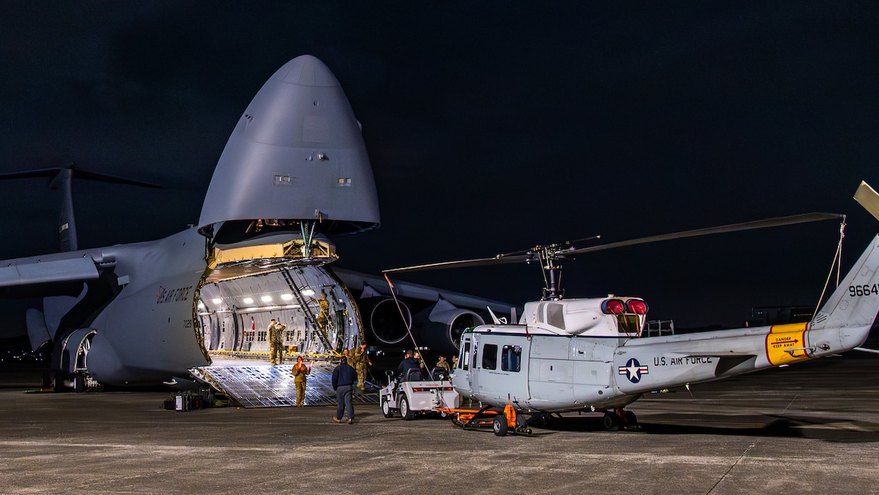 C-5 loading helicopter into cargo bay