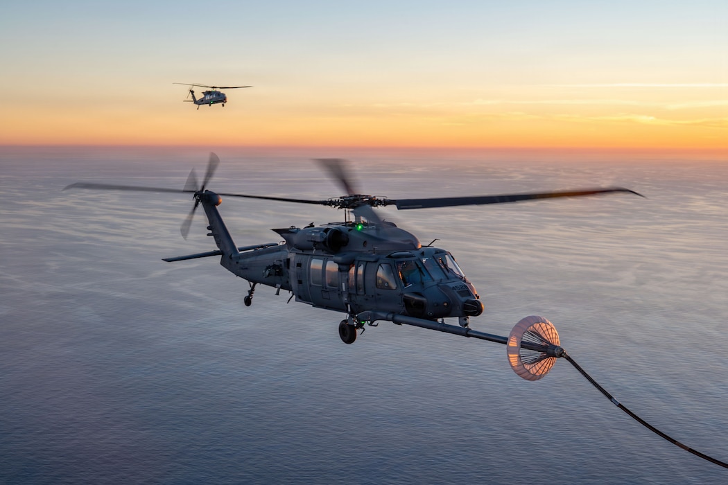 Helicopter receiving fuel in air